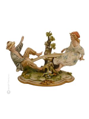 NIÑOS CON COLUMPIO Figura de porcelana Capodimonte, artesanía Made in Italy